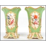 A pair of 19th century English factory vases havin