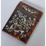 A 19th century tortoise shell card case having an