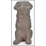 A 19th century cast iron figurine of a retriever d