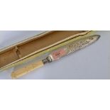 A 19th century ivory handled cake knife with silve