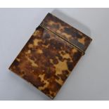 A 19th century tortoise shell card case having a b