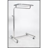 An original mid century Industrial surgeons raised  trolley tray stand of tubular metal and