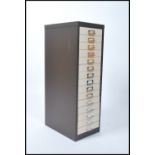 A 20th century retro upright metal filing cabinet in two tone colour way by Bisley. The cabinet with