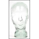 A 20th century moulded pressed glass phrenology type head - shop display stand / millinery mannequin