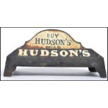 A cast metal point of sale advertising dog water bowl for Hudsons Soap, finished in a two tone