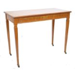 A 19th century Victorian satinwood side hall / console table in the Adams style raised on square