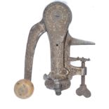 A  Original Safety Bar Cork Screw Gilchrist 1897 reg No 543083, in decorative cast iron body, wooden