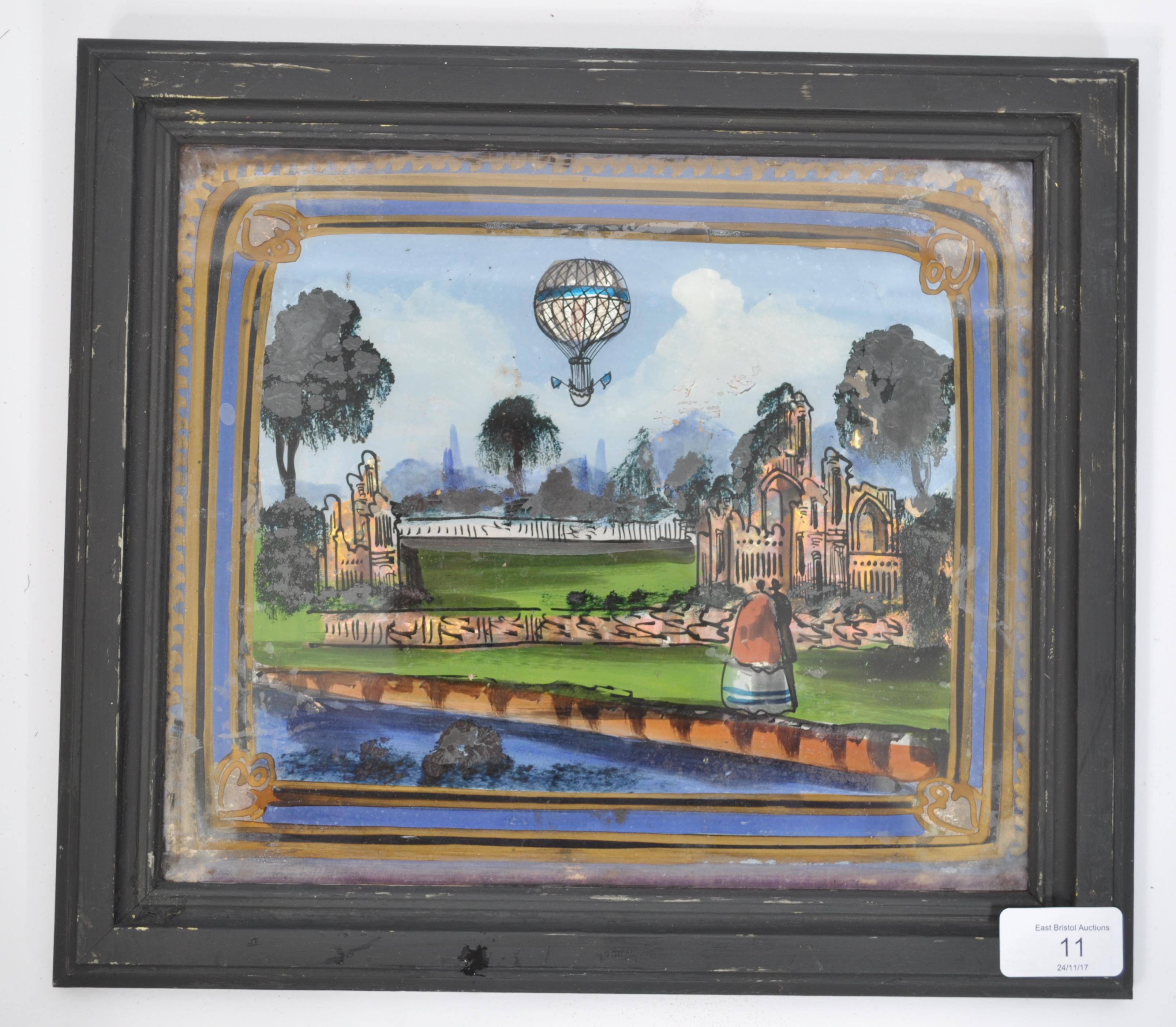 A 19th century Crystoleum painting / reverse on glass depicting a scene of a hot air balloon over - Image 2 of 5