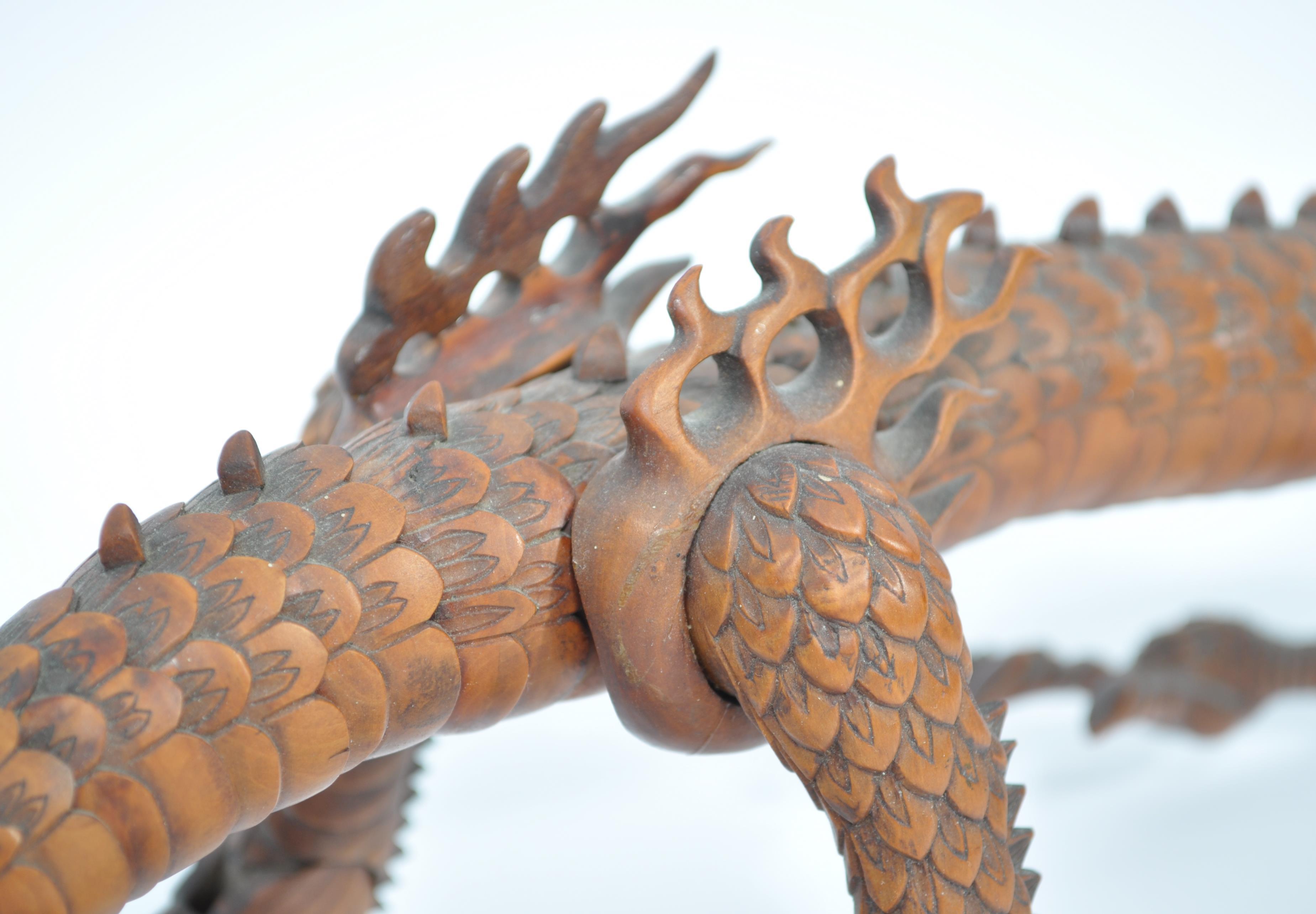 A Japanese carved and articulated wooden dragon Meiji period (1868-1912), probably boxwood, the body - Image 6 of 15