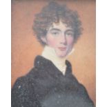 A 19th century portrait miniature painting on ivory plaque depicting a young gentleman. The painting