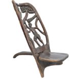 A late 19th century / early  20th century hardwood African tribal Congo birthing chair of two part