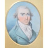 A 19th century portrait miniature painting on ivory plaque depicting a well dressed gentleman.