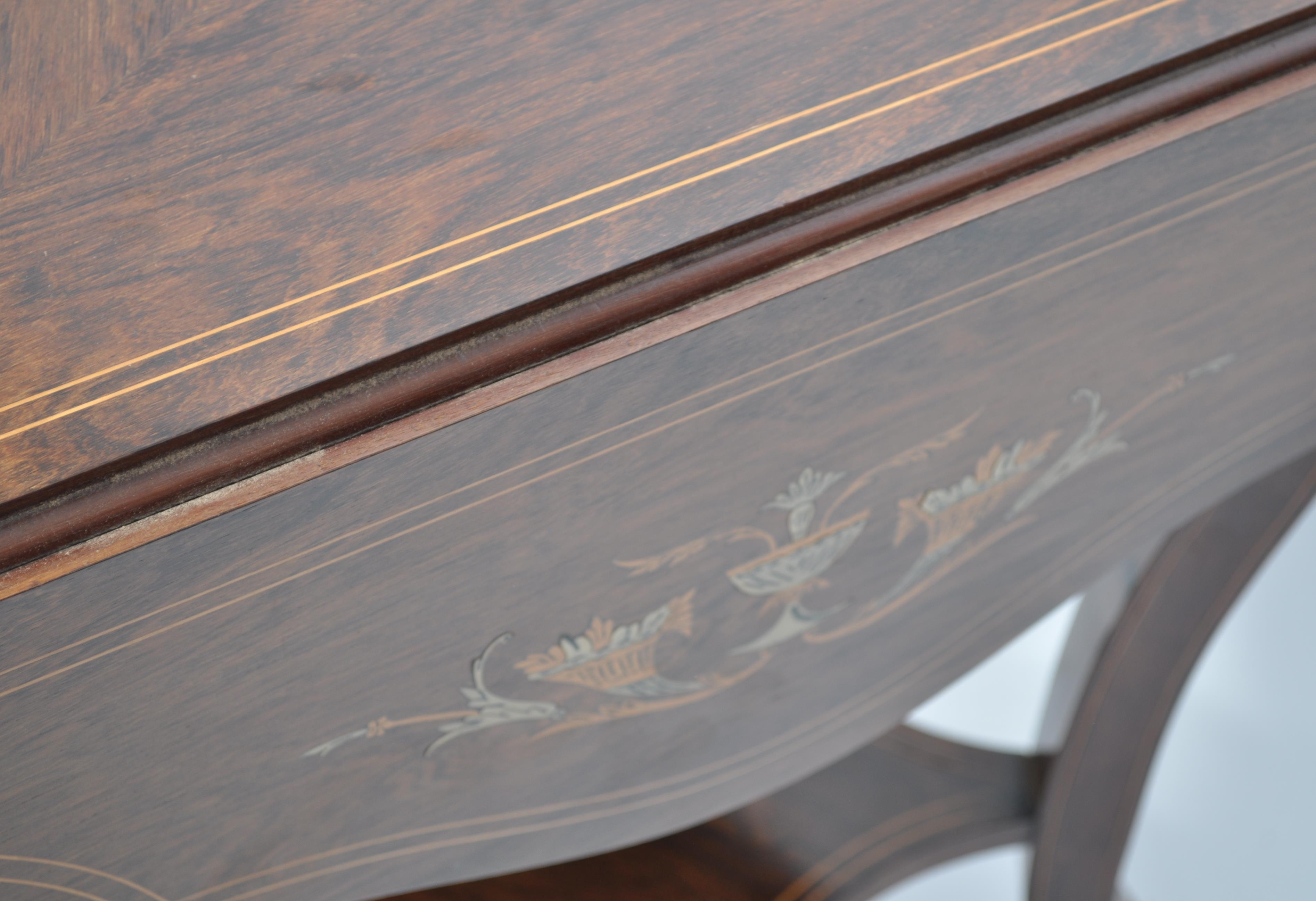 A late 19th / Edwardian rosewood inlaid envelope card table, the swivel top enclosing a green felt - Image 3 of 6