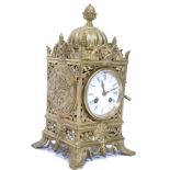 A 19th century French gilt brass mantel clock. The clock having an day movement striking on a bell