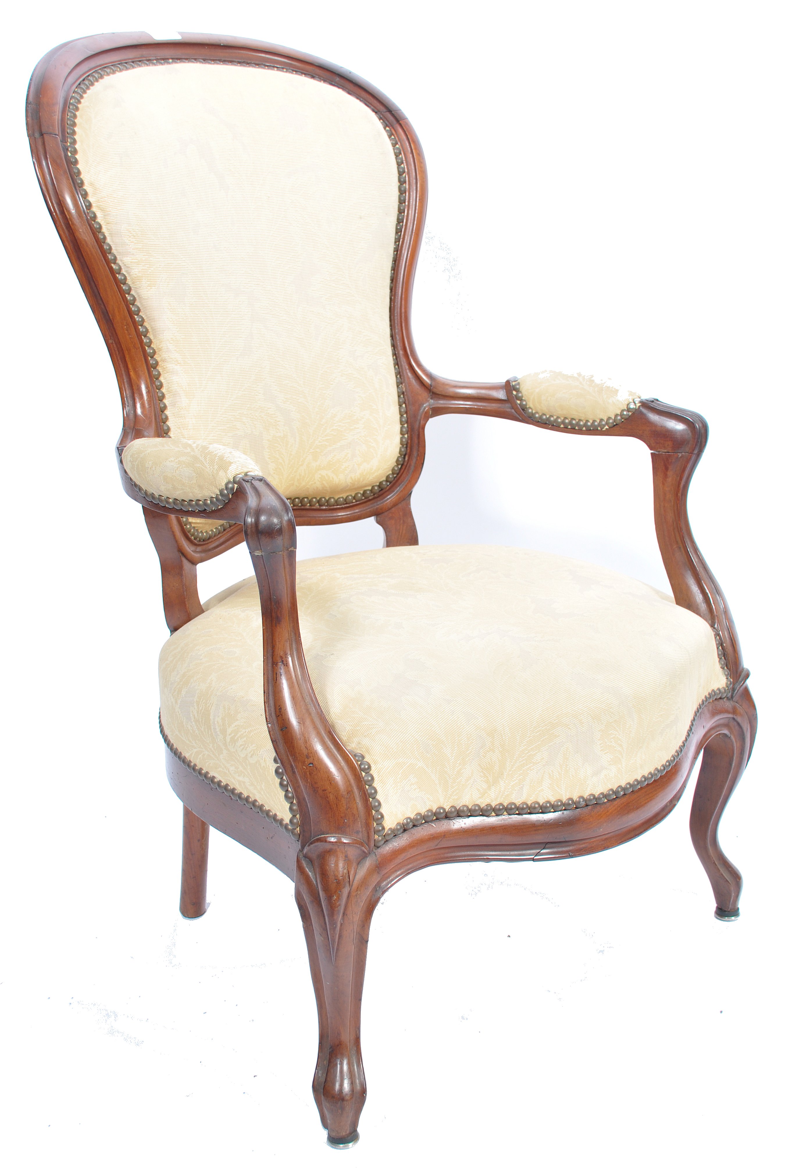 A good 19th century French mahogany fauteuil armchair. Raised on shaped cabriole legs with