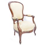A good 19th century French mahogany fauteuil armchair. Raised on shaped cabriole legs with
