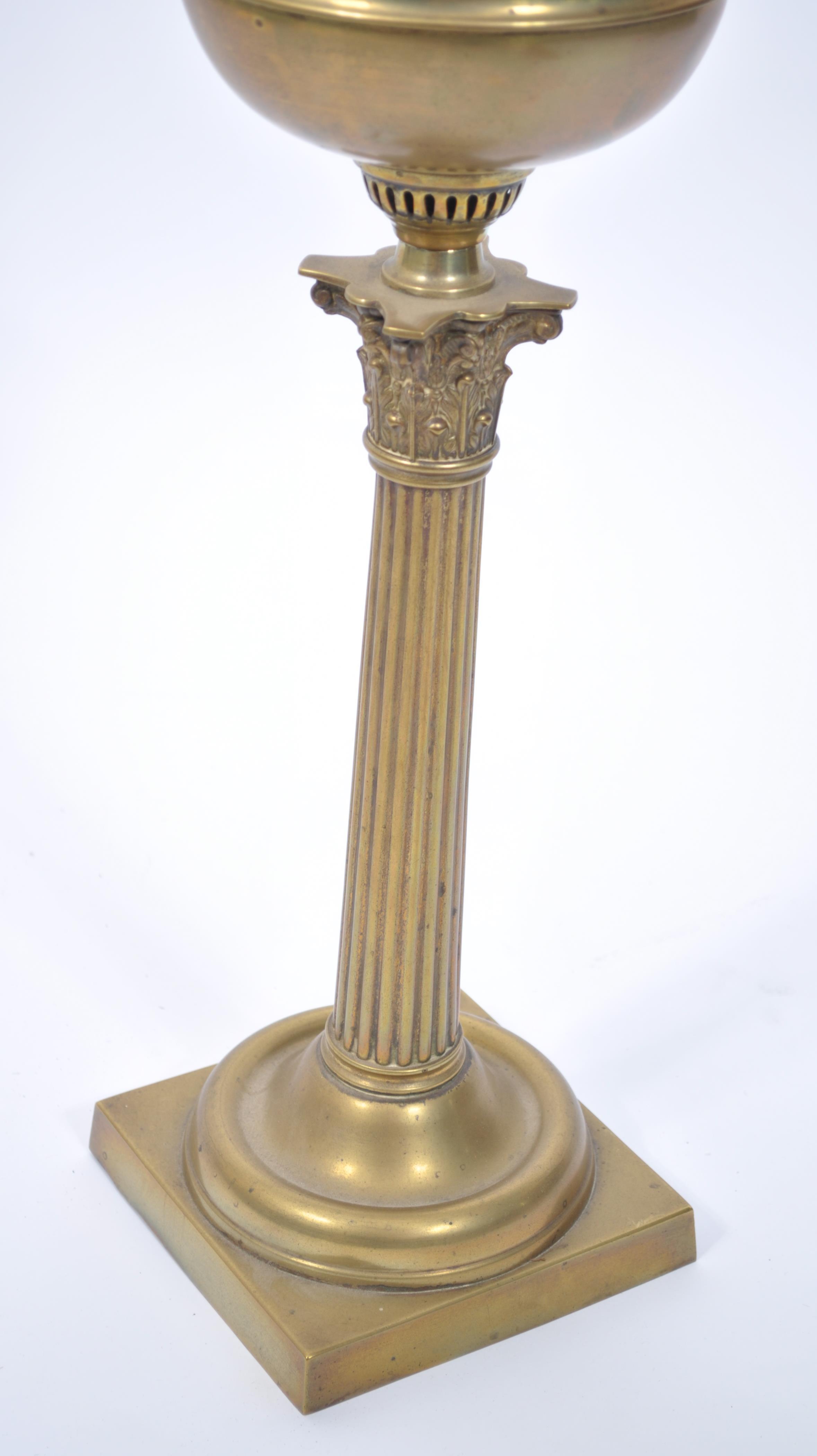 A late 19th century Victorian brass oil lamp and shape by Maple & Co, London. The brass lamp with - Image 2 of 7