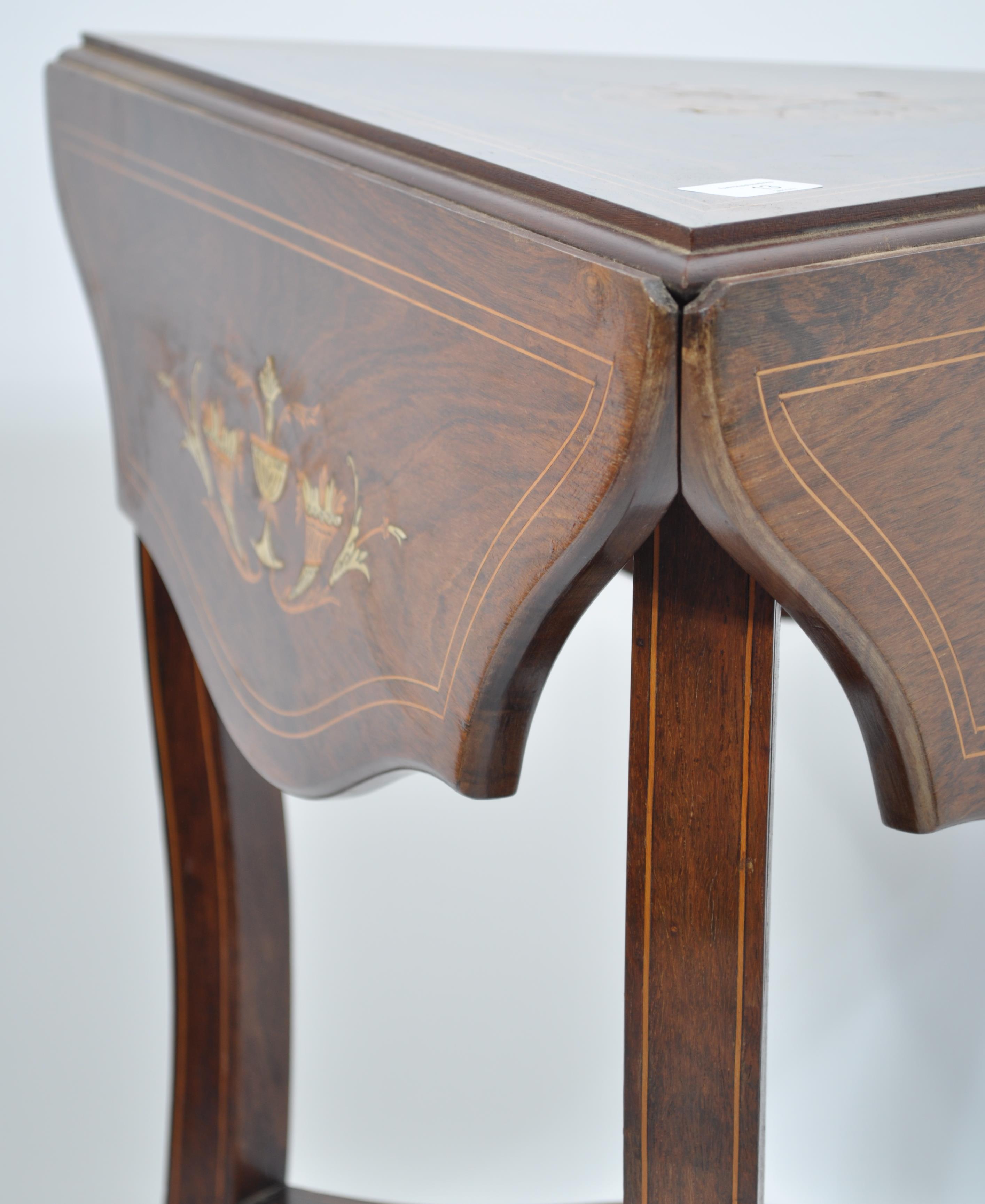 A late 19th / Edwardian rosewood inlaid envelope card table, the swivel top enclosing a green felt - Image 6 of 6