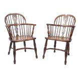 A pair of 18th century Yew wood & Elm country Windsor armchairs / chairs. Each raised on bobbin