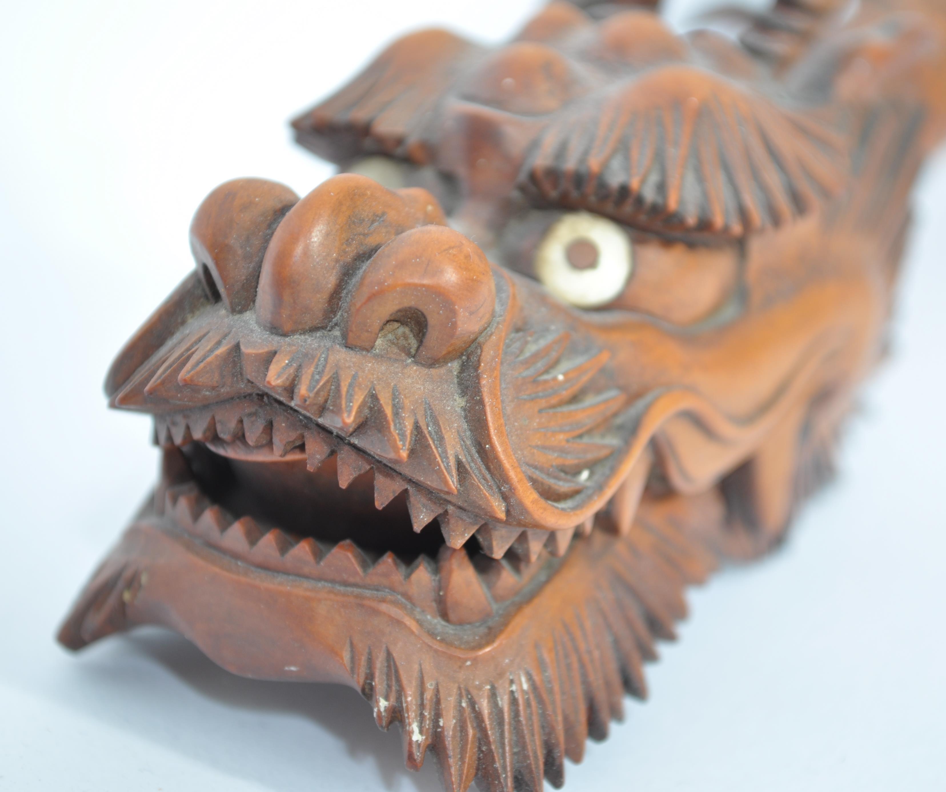 A Japanese carved and articulated wooden dragon Meiji period (1868-1912), probably boxwood, the body - Image 5 of 15