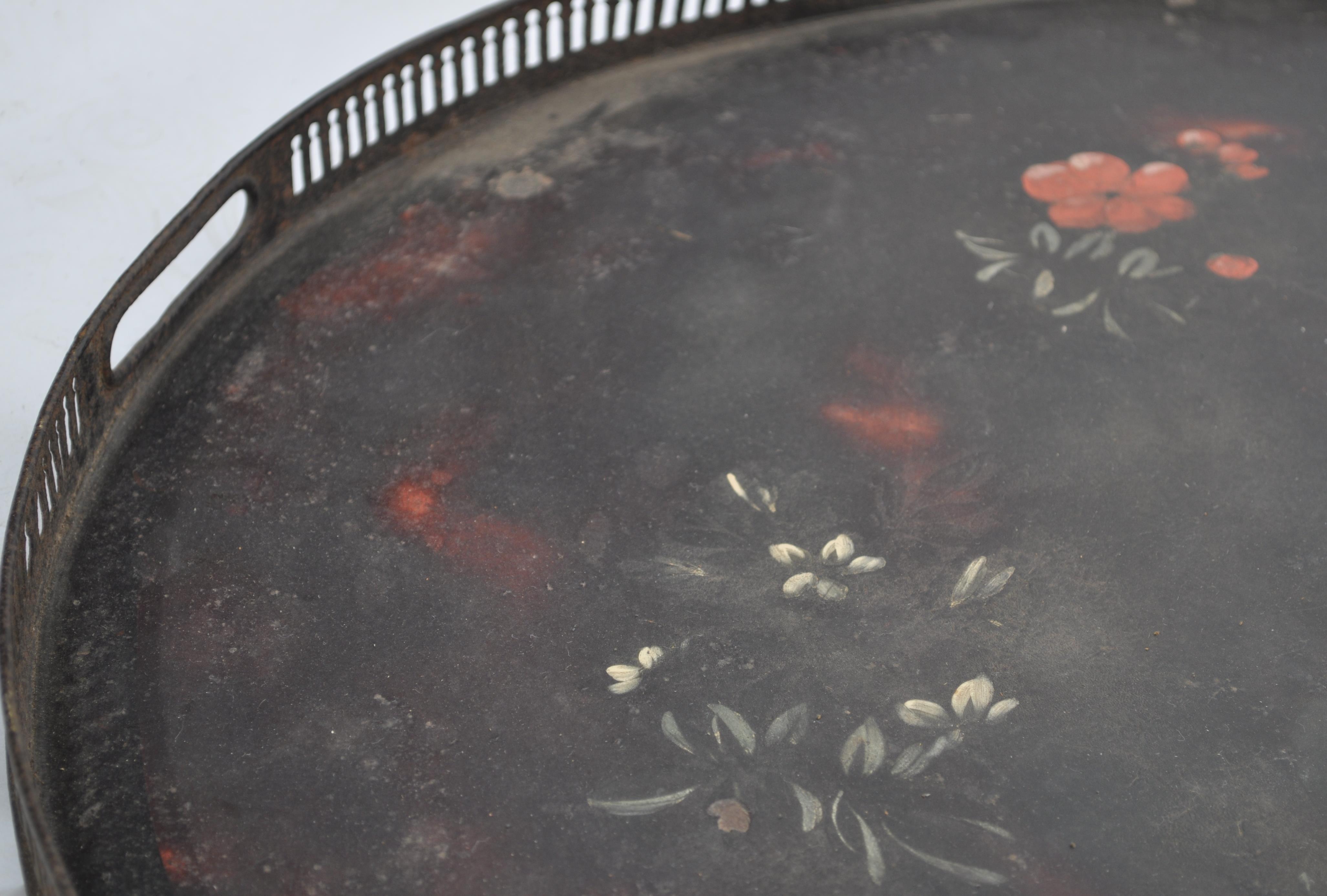 A late 18th century Georgian Pontypool Japanned tray of oval form having a black ground with painted - Image 5 of 6