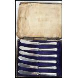 A set of six silver hallmarked handled butter kniv