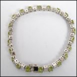 A 20th century ladies silver and peridot line / te