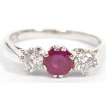 An 18ct white gold ruby and diamond 3 stone ladies