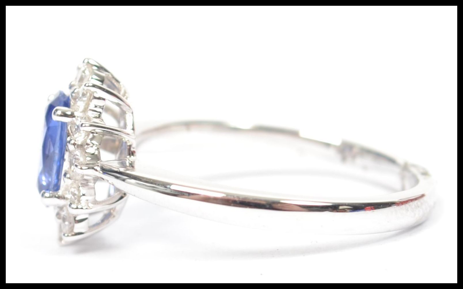 An 18ct white gold sapphire and diamond halo clust - Image 3 of 5