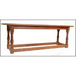 A 19th century carved oak refectory - scullery table / dining table by Castle's Shipbreaking Co Ltd,