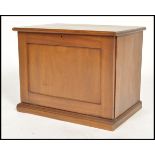 An Edwardian mahogany workbox compendium writing slope cabinet having a fall front panel with