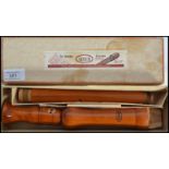 A vintage Adler three piece wooden recorder musical instrument complete in original box with applied