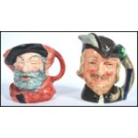 Two vintage 20th century Royal Doulton ceramic Toby Character jugs. Robin Hood and Falstaff. Doulton