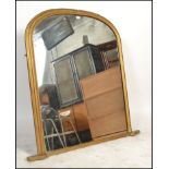 A good 19th century large overmantel mirror. Of wooded gilded form having large arch with plinth