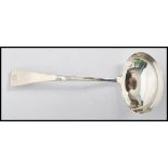 A silver hallmarked George III silver toddy ladle, dating to 1811 possibly by George Wintle (