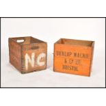 2 vintage wooden Industrial advertising - work crates each with notation for Dunlop having sectional