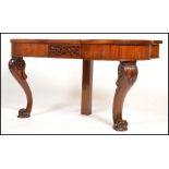 A 19th century Victorian console table of shaped form being raised on carved bulbous supports with