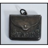 A George V silver stamp case, Birmingham 1911, the front inscribed stamps with marks for C&N / O&