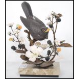 An Albany Fine China sculptured bronze and porcelain model of a Blackbird by David Burnham-Smith,