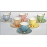 A set of six Royal Albert Gossamer tea cups each with matching saucers. Elegant form with gilt