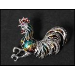 A 925 silver plique a jour enamel figural brooch in the form of  a cockerel set with marcasite