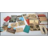 A collection of vintage 20th century Souvenir postcard sets from around the the world to include