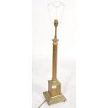 A 19th century large brass column table lamp. The classical column having a square base with