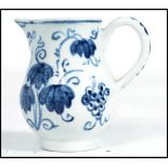 An early 19th century blue and white pearlware pearl ware hand painted sparrow beak miniature jug.