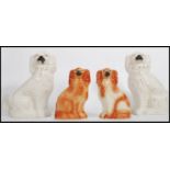 A pair of large 20th century Staffordshire dogs, possibly Beswick being white glazed together with