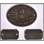 A group of three vintage early 20th century Industrial cast iron metal machine name plaques to