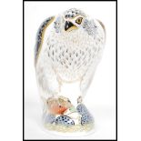 A Royal Crown Derby Osprey paperweight, with red stamp to underside, dated 2011 and silver