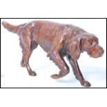 Hunting interest - A 20th century Continental solid cast cold painted bronze figural sporting