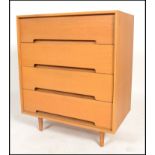 A 1970's retro light oak straight four drawer chest of drawers designed by John and Sylvia Reid