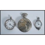 A silver continental pocket watch having an enamel face with faceted hands and a roman numeral